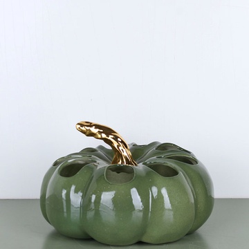Ceramic pumpkin green with holes and gold