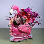 Floral composition in a pink flamingo with ginestra