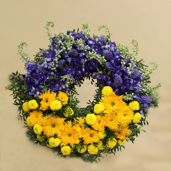 Funeral wreath yellow-blue