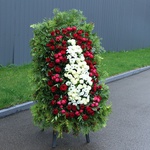 The mourning wreath is white and red