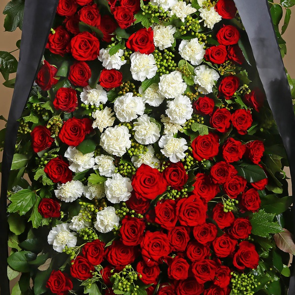 Funeral wreath with white carnation