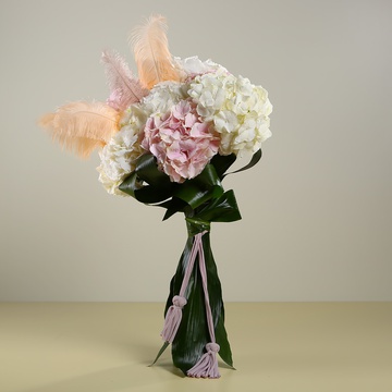 Bouquet of hydrangeas and feathers