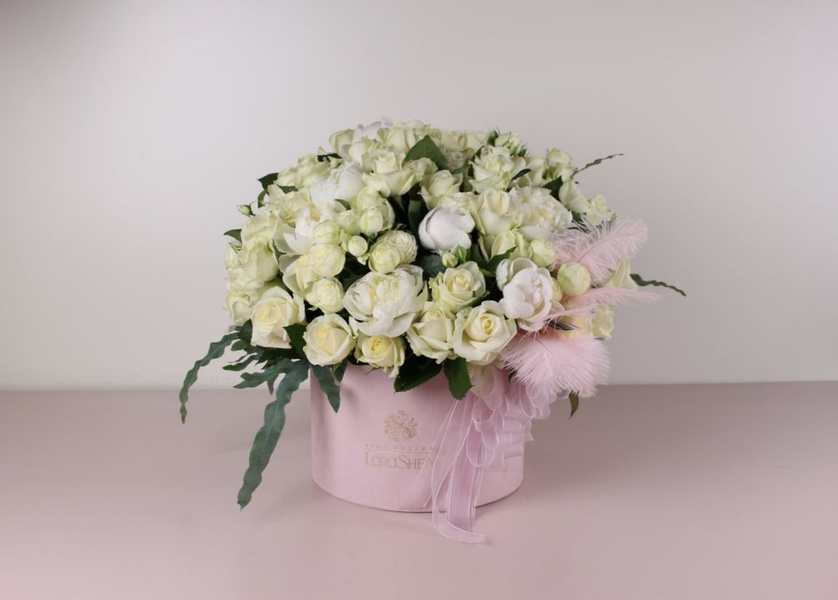 Roses and peonies in a hatbox