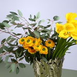 Floral composition in yellow tones in a vase