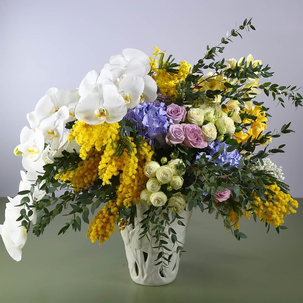 Floral interior composition with mimosa