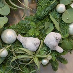 New Year's wreath in green and white colors