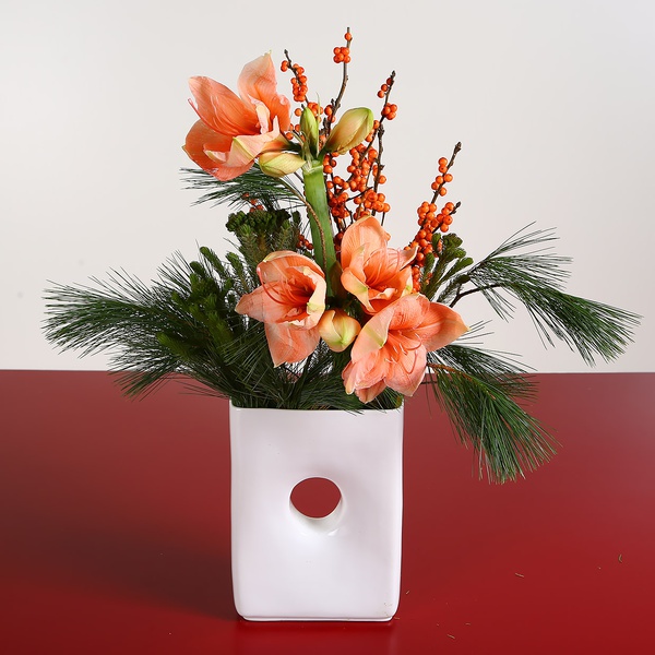 Interior bouquet with amaryllis in a vase