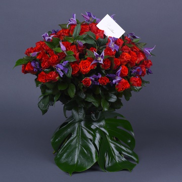 Bouquet of 101 red roses El Toro and clematis