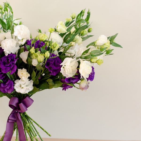 Bouquet of eustoma white-violet