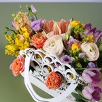 Floral composition in a bag peach-lilac