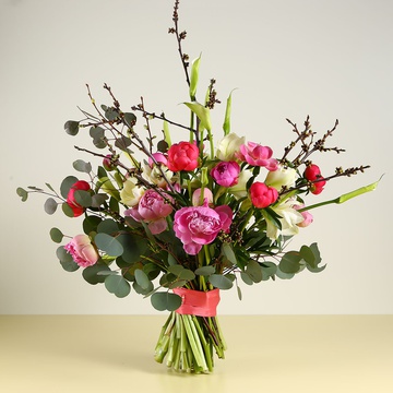 Spring bouquet with peonies and calla lilies
