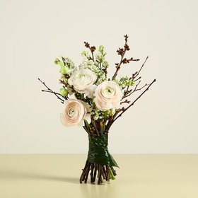 Bouquet with ranunculus and twigs