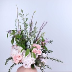 Bouquet lilac-pink with hydrangea in a vase