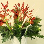 Interior bouquet with red amaryllis in a vase