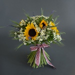 Ethnic bouquet with sunflowers and tanacetum