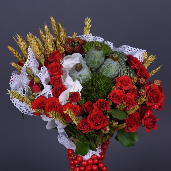 Ethno bouquet with wheat, poppy seeds and beads