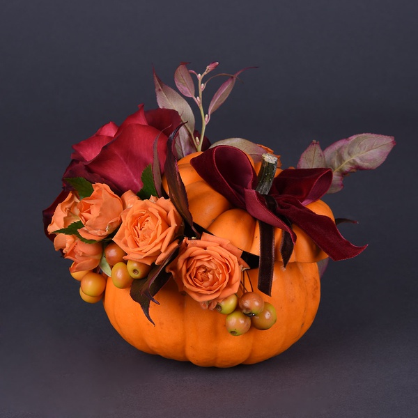Floral composition in a mini pumpkin
