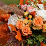 Bouquet with orange thuja