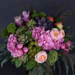Flower bouquet with artichoke, apples and grapes