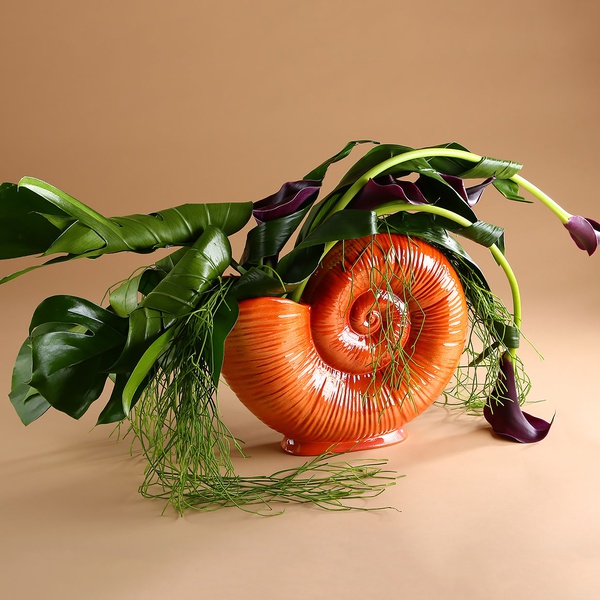 Calla lilies in a vase "Lunar spiral"