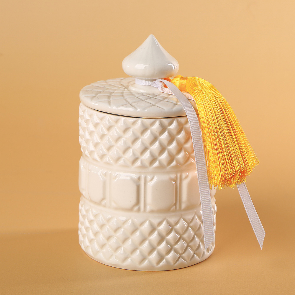 Scented candle in a ceramic glass with a lid