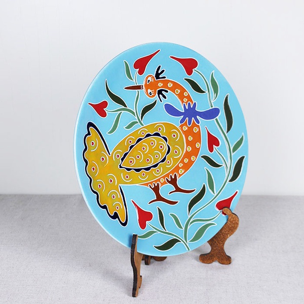 Plate "Peacock in flowers" blue