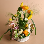 Easter composition in a ceramic basket