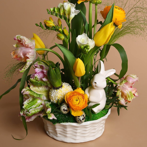Easter composition in a ceramic basket