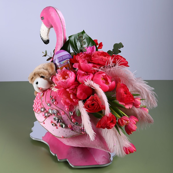 Floral composition in pink flamingo with peonies