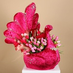 Floral composition in pink peacock with tulips