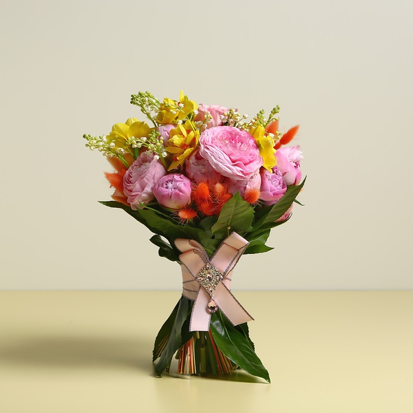 Bouquet with daffodils and lilies of the valley