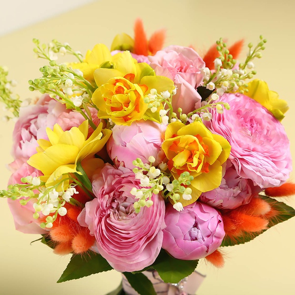 Bouquet with daffodils and lilies of the valley