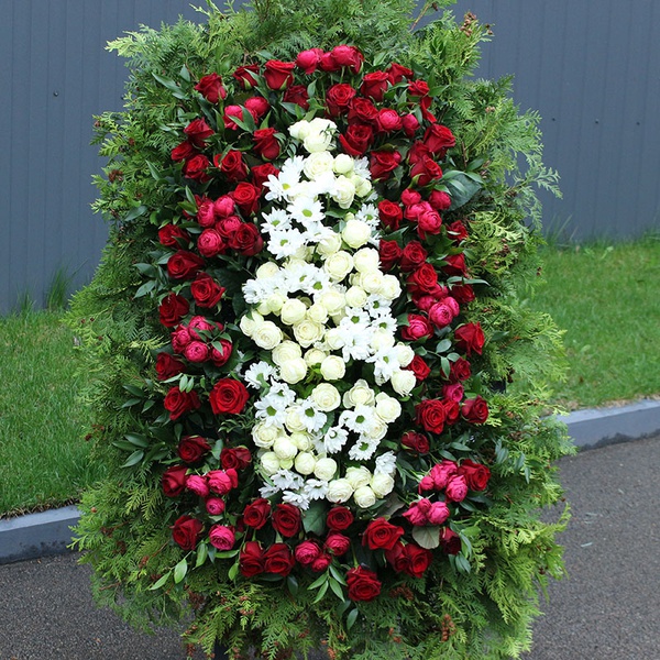 The mourning wreath is white and red