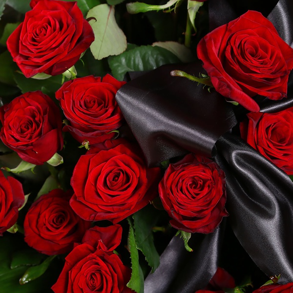 Funeral basket of red roses