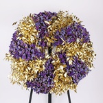 Funeral wreath made of statice and gold ruscus