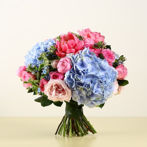 Bouquet with peonies and blue hydrangeas