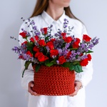 Composition of red roses with lavender