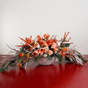 Peach Christmas composition with amaryllis