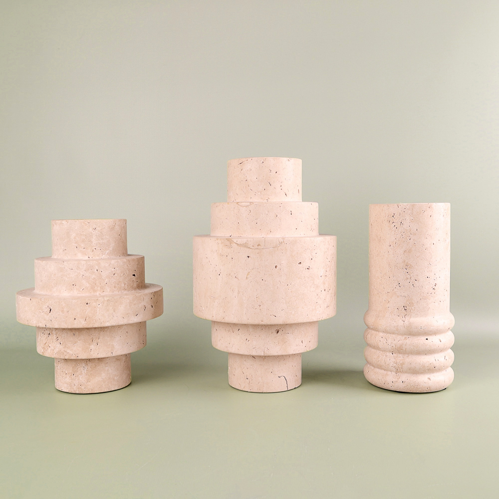 Set of sculptural vases made of natural travertine/marble (3 pieces)