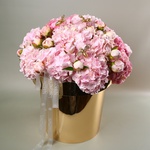 "Honey Garden" - a composition of hydrangeas and peonies in a golden pot