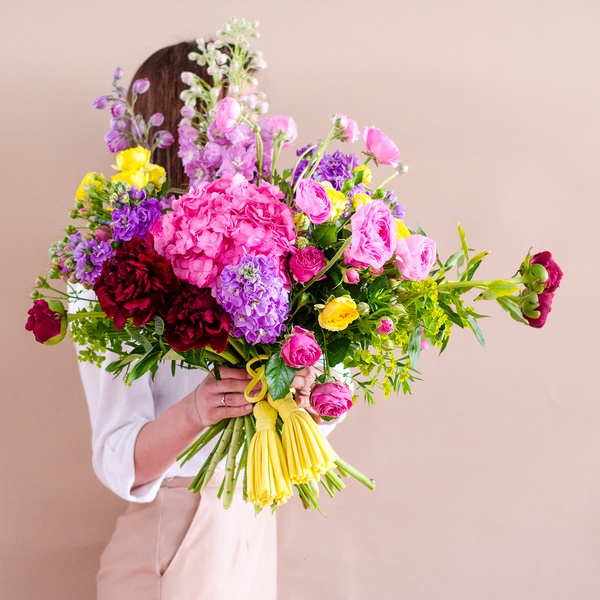 Bright summer bouquet with delphinium