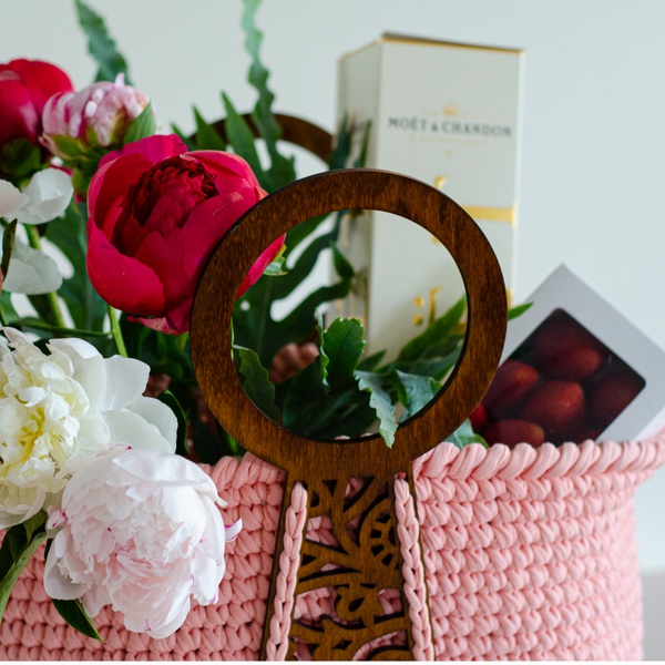 Gift set of peonies mix and strawberries in a bag