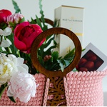 Gift set of peonies mix and strawberries in a bag