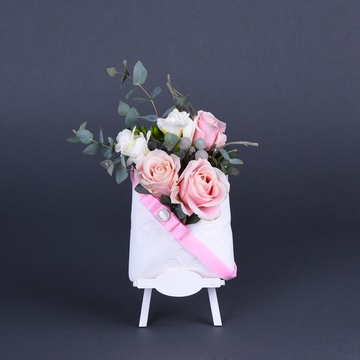 Flowers in an envelope in white and pink colors