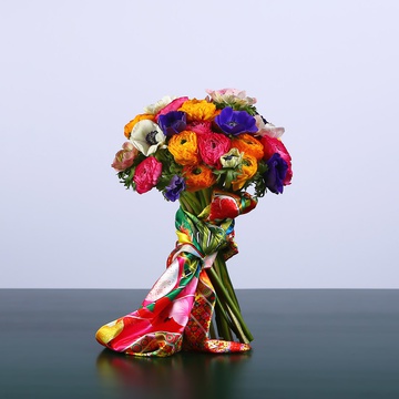Bouquet of a mix of anemones and ranunculus