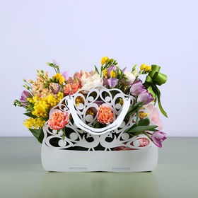 Floral composition in a bag peach-lilac