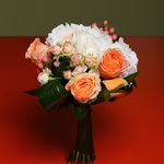 Bouquet of hydrangea and colored greenery