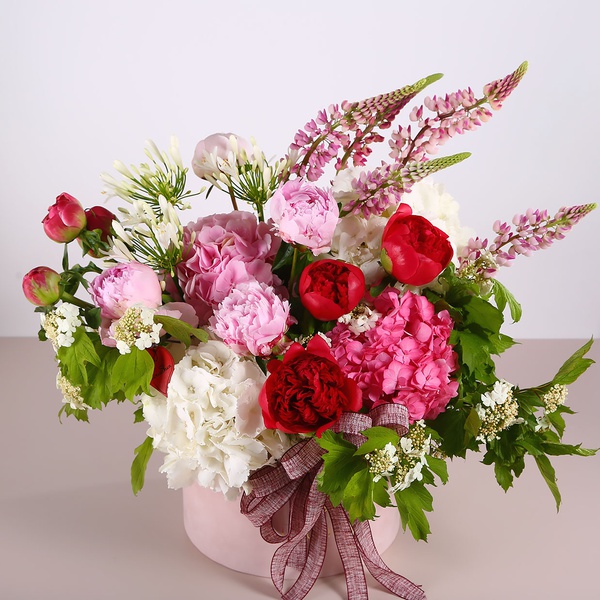 Summer composition with peonies and hydrangea