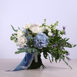 Summer bouquet with blue hydrangeas