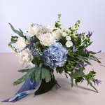 Summer bouquet with blue hydrangeas